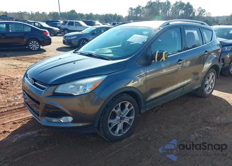 2016 Ford Escape Titanium z USA, uszkodzony, nr VIN 1FMCU0J92GUB43545